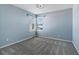 Charming bedroom with light blue walls and new carpet at 8086 S Grand Baker Way, Aurora, CO 80016