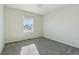Simple bedroom with neutral walls and a window view at 8086 S Grand Baker Way, Aurora, CO 80016