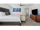 Bright bedroom featuring a king-size bed and ample natural light at 8086 S Grand Baker Way, Aurora, CO 80016