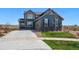 Charming two-story home with stone accents, attached garage, and well-manicured lawn at 8086 S Grand Baker Way, Aurora, CO 80016
