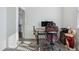 Bright home office features a desk, chair, and built-in shelving at 8086 S Grand Baker Way, Aurora, CO 80016