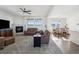 Spacious living room includes a fireplace and ample natural light at 8086 S Grand Baker Way, Aurora, CO 80016