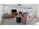 Comfortable living room with fireplace and ample seating at 8086 S Grand Baker Way, Aurora, CO 80016