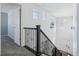 Elegant staircase with wrought iron railing and natural light at 8086 S Grand Baker Way, Aurora, CO 80016