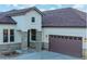 Stunning home with stone accents, a two-car garage, and a well-maintained lawn for curb appeal at 4502 Echo Cliff Ln, Larkspur, CO 80118