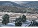 Beautiful winter landscape featuring a snow-covered hillside with trees at 4502 Echo Cliff Ln, Larkspur, CO 80118