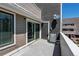 Balcony area with sliding glass door and air conditioning unit at 5250 S Huron Way # 10-207, Littleton, CO 80120