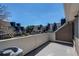 Balcony showing community view with multiple townhome roofs and blue sky at 5250 S Huron Way # 10-207, Littleton, CO 80120