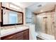 Contemporary bathroom design with sleek vanity, glass shower, and modern tile work for a luxurious feel at 5250 S Huron Way # 10-207, Littleton, CO 80120
