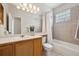 Clean bathroom with updated vanity and shower/tub combo at 2279 S Joliet Way, Aurora, CO 80014