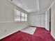 Basement with carpet, window, and closet at 778 S Fairplay Ct, Aurora, CO 80012