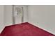 Bedroom with neutral walls, red carpet, and ample natural light at 778 S Fairplay Ct, Aurora, CO 80012