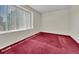 Cozy bedroom with a large window providing natural light at 778 S Fairplay Ct, Aurora, CO 80012
