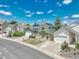Charming home with solar panels, well-kept landscaping, and a two-car garage in a suburban neighborhood at 778 S Fairplay Ct, Aurora, CO 80012