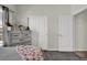 Bedroom featuring neutral walls and carpeted floors, creating a peaceful space at 7433 Ellingwood Cir, Frederick, CO 80504