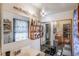 Well-lit bathroom with a mirrored closet and a vanity, creating a bright and functional space at 2699 S Xanadu Way # A, Aurora, CO 80014