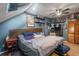 Cozy bedroom features a unique layout, with a sloped ceiling, providing an attic-like feel at 2699 S Xanadu Way # A, Aurora, CO 80014