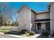 A well-maintained two-story townhouse exterior shows green lawn and an inviting entrance at 2699 S Xanadu Way # A, Aurora, CO 80014