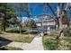 Charming home exterior with a fenced pool and well-manicured landscaping, ideal for outdoor enjoyment at 2699 S Xanadu Way # A, Aurora, CO 80014
