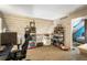 Finished loft area with storage shelves, unique ceiling, and carpeted floor at 2699 S Xanadu Way # A, Aurora, CO 80014