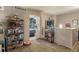 Loft area with carpeted floor, shelving, and access to another room at 2699 S Xanadu Way # A, Aurora, CO 80014