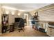 Finished loft area with desk, computer, unique ceiling, and carpeted floor at 2699 S Xanadu Way # A, Aurora, CO 80014
