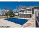 View of a community pool with a cover on and multi-story buildings in the background at 2699 S Xanadu Way # A, Aurora, CO 80014