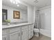 Bright bathroom with modern fixtures, a sleek vanity, and a shower-tub combination, ensuring a spa-like experience at 9378 E 60Th Pl, Denver, CO 80238