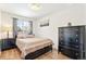 Cozy bedroom with hardwood floors and a neutral color scheme at 2222-2224 Hooker St, Denver, CO 80211