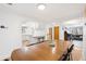 Inviting dining room adjacent to kitchen with hardwood floors and plenty of seating at 2222-2224 Hooker St, Denver, CO 80211