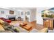 Spacious living room with fireplace, hardwood floors, and comfortable seating arrangement at 2222-2224 Hooker St, Denver, CO 80211
