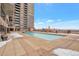 Rooftop pool with city views, surrounded by a deck perfect for lounging and relaxation at 2990 E 17Th Ave # 1102, Denver, CO 80206