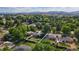Aerial view of the property showcasing its location in a lush, green neighborhood at 216 Hemlock, Broomfield, CO 80020