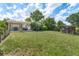 Expansive backyard featuring a well-manicured lawn and mature landscaping at 216 Hemlock, Broomfield, CO 80020