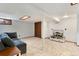 Spacious basement includes a comfortable seating area and entertainment center at 216 Hemlock, Broomfield, CO 80020