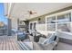 Entertaining back porch boasts a ceiling fan and outdoor kitchen area at 8796 E 150Th Ct, Thornton, CO 80602