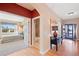 Inviting foyer featuring hardwood floors, and views of the bedroom and bathroom adding depth and character to this home at 8796 E 150Th Ct, Thornton, CO 80602
