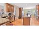 Well-lit kitchen with granite countertops, stainless steel appliances, and an open layout at 8796 E 150Th Ct, Thornton, CO 80602