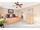 Beautiful main bedroom with an archway leading to the ensuite bathroom at 8796 E 150Th Ct, Thornton, CO 80602
