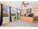 Bright main bedroom featuring ample natural light, and a tray ceiling at 8796 E 150Th Ct, Thornton, CO 80602