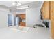 Well-lit kitchen featuring stainless steel appliances and ample counter space at 1680 S Patton Ct, Denver, CO 80219