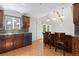 Cozy kitchen with bar seating and garden views, ideal for casual dining at 310 S Alkire St, Lakewood, CO 80228