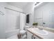 Bathroom with white tile tub and shower at 12069 Monaco Ct, Brighton, CO 80602