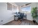 Office featuring wood floors, a large window and inspirational wall decor at 12069 Monaco Ct, Brighton, CO 80602