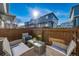 Cozy outdoor patio with stylish seating, perfect for relaxing and entertaining in a private setting at 12069 Monaco Ct, Brighton, CO 80602