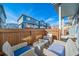 Inviting outdoor patio with comfortable seating, ideal for enjoying the fresh air and outdoor living at 12069 Monaco Ct, Brighton, CO 80602