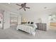 Bright bedroom with natural light, multiple storage options, and staircase access at 4222 Serenade Rd, Castle Rock, CO 80104
