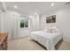 Bedroom with a white walls, white bedding and neutral carpet at 4222 Serenade Rd, Castle Rock, CO 80104