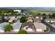 Panoramic aerial view of homes nestled in a scenic community, with mountain backdrop at 23 Carla Way, Broomfield, CO 80020
