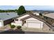 Inviting single-Gathering home with an attached garage and lush landscaping, creating an appealing and welcoming facade at 23 Carla Way, Broomfield, CO 80020